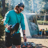 enjoying bbq on camping with prota canvas tent setup